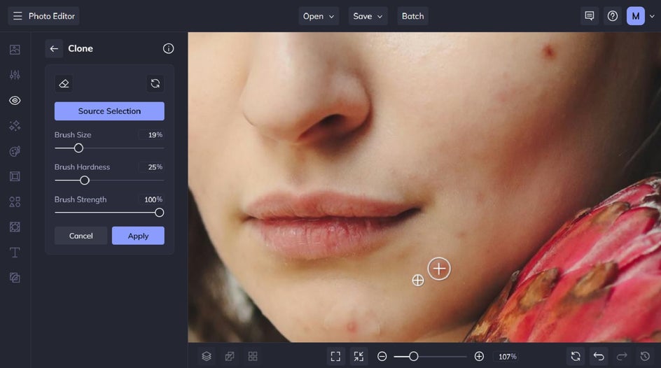Close-up view of blemish removal using BeFunky’s clone tool on facial skin.