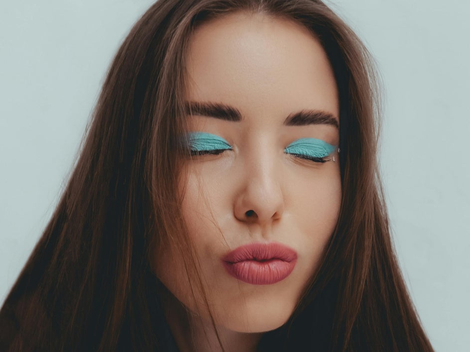 After: Smooth makeup look enhanced using the clone tool for flawless blending of eyeshadow.